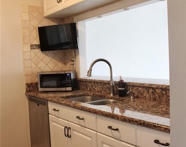 9101 Tudor Drive - Photo Thumbnail 8
