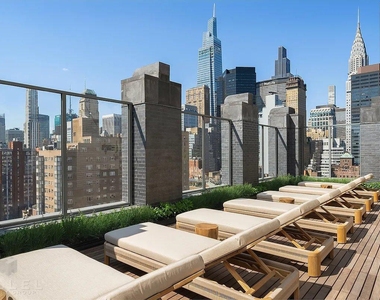 East 36th Street - Photo Thumbnail 12