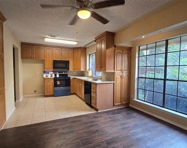 1117 Blue Carriage Lane N - Photo Thumbnail 2