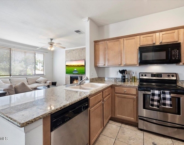 7009 E Acoma Drive - Photo Thumbnail 7