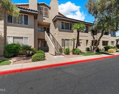7009 E Acoma Drive - Photo Thumbnail 1