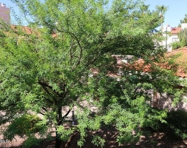 9750 N 94th Place - Photo Thumbnail 9