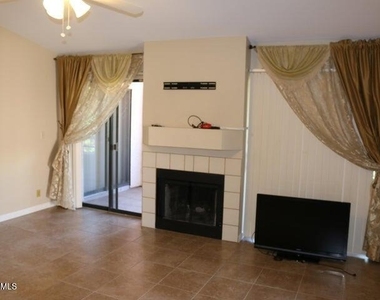 9750 N 94th Place - Photo Thumbnail 3