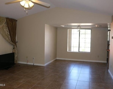 9750 N 94th Place - Photo Thumbnail 1