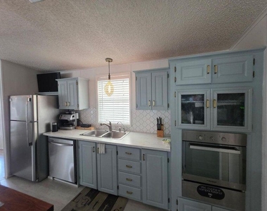 3712 Spanish Cedar Place W - Photo Thumbnail 4
