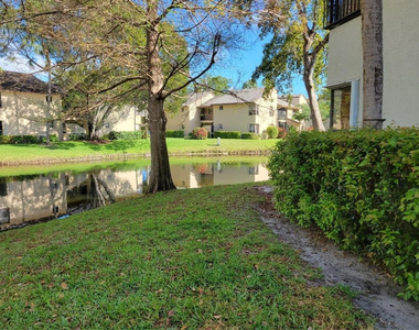 3559 Cocoplum Circle - Photo Thumbnail 1