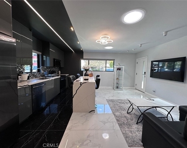 12838 1/2 Kling Street - Photo Thumbnail 1