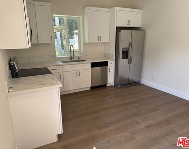 4608 Whispring Wood Court - Photo Thumbnail 2