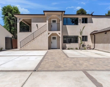 6913 Encino Avenue - Photo Thumbnail 5