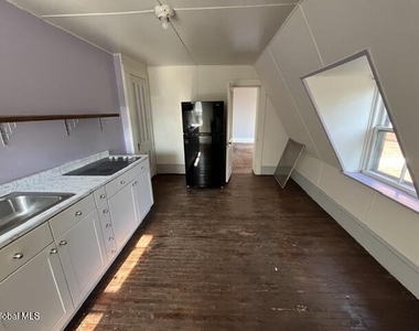 215 S William Street - Photo Thumbnail 4