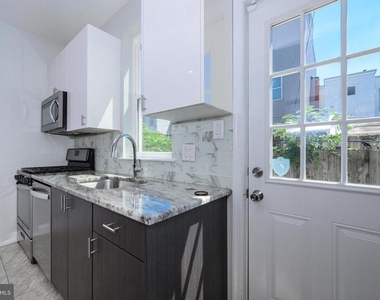 1439 N Newkirk Street - Photo Thumbnail 8