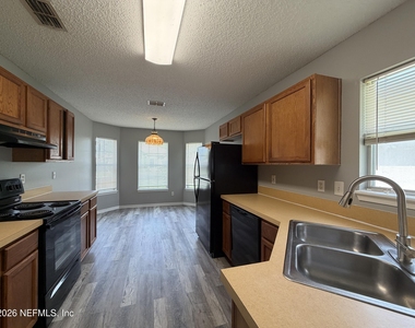 4339 Hanging Moss Drive - Photo Thumbnail 3