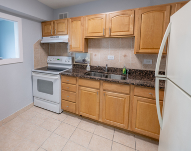 7337 S South Shore Drive - Photo Thumbnail 2