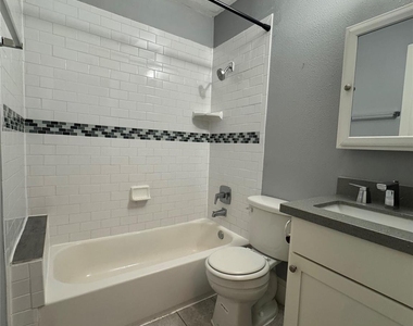 1011 E 6th 1/2 Street - Photo Thumbnail 4