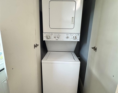 1011 E 6th 1/2 Street - Photo Thumbnail 5