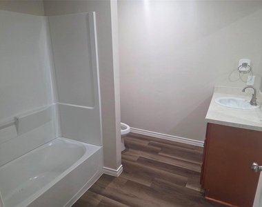 9831 Pelsey Street - Photo Thumbnail 3