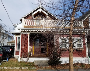 107 Asbury Avenue - Photo Thumbnail 2