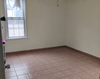 98-02 103 Avenue - Photo Thumbnail 2