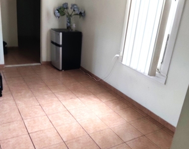 98-02 103 Avenue - Photo Thumbnail 1