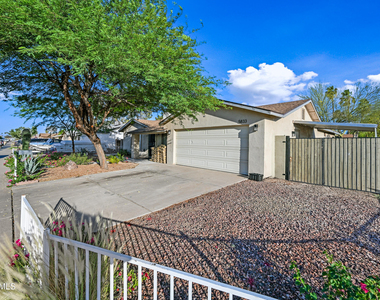 5833 W John Cabot Road - Photo Thumbnail 1