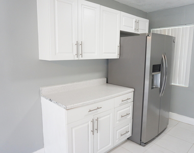 1456 W 29th Street - Photo Thumbnail 2