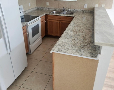 1669 W 27th Street - Photo Thumbnail 1