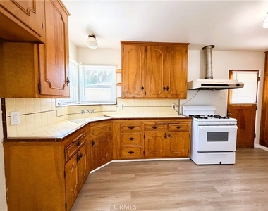 12911 Whitewood Avenue - Photo Thumbnail 6
