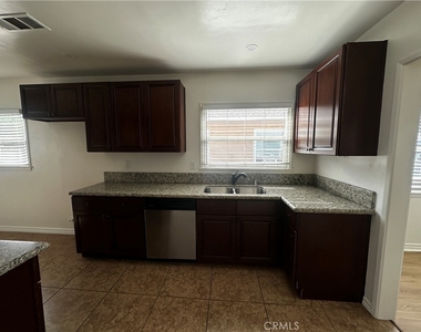 6108 Village Road - Photo Thumbnail 6