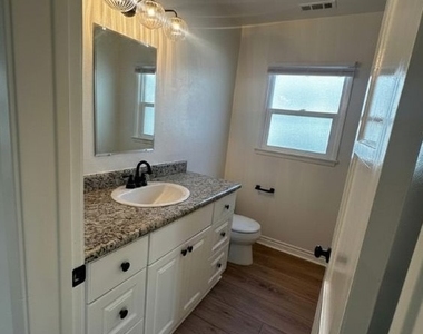6108 Village Road - Photo Thumbnail 15