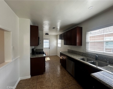 6108 Village Road - Photo Thumbnail 5