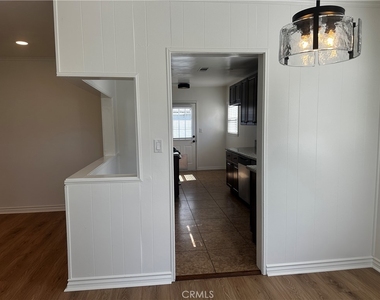 6108 Village Road - Photo Thumbnail 4