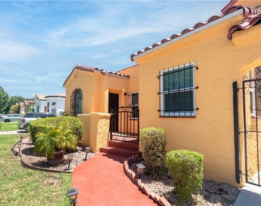 8930 S Hobart Blvd - Photo Thumbnail 1