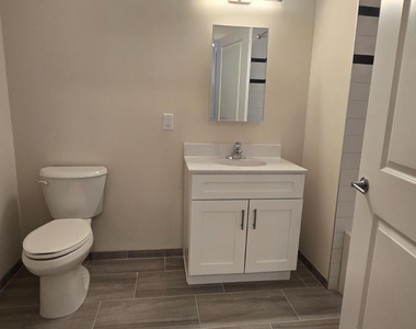 211 Henderson Road - Photo Thumbnail 5