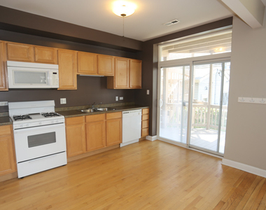 5208 N Sawyer Avenue - Photo Thumbnail 3