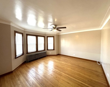 7050 S Maplewood Avenue - Photo Thumbnail 2