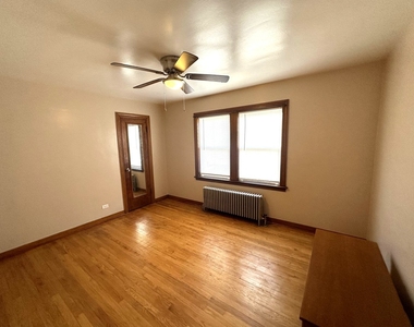 7050 S Maplewood Avenue - Photo Thumbnail 4