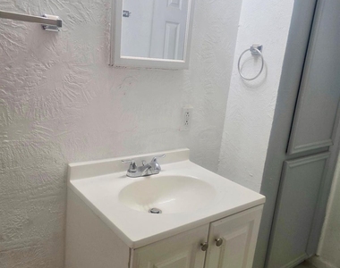 7702 Claiborne Street - Photo Thumbnail 7
