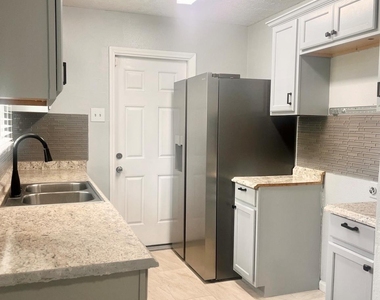 7702 Claiborne Street - Photo Thumbnail 6