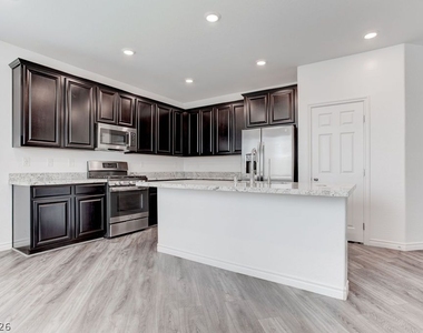 7106 Calvert Cliffs Street - Photo Thumbnail 11