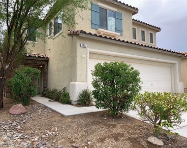 9933 W Diablo Drive - Photo Thumbnail 2