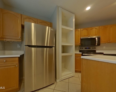3413 E Dragoon Avenue - Photo Thumbnail 4