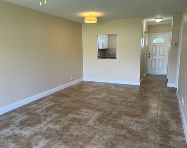 9851 Sandalfoot Boulevard - Photo Thumbnail 5
