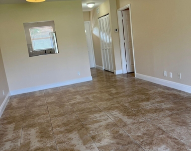 9851 Sandalfoot Boulevard - Photo Thumbnail 9
