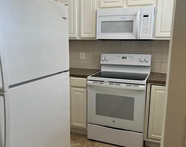 9851 Sandalfoot Boulevard - Photo Thumbnail 2