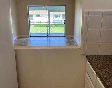 9851 Sandalfoot Boulevard - Photo Thumbnail 1