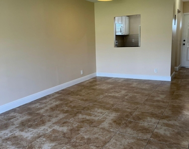 9851 Sandalfoot Boulevard - Photo Thumbnail 7