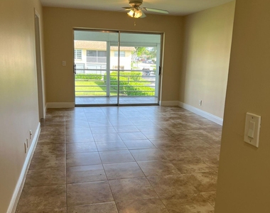 9851 Sandalfoot Boulevard - Photo Thumbnail 6