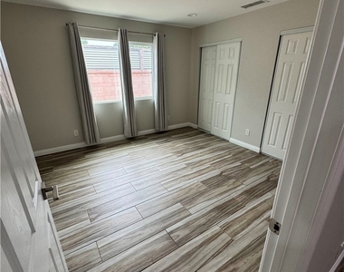 9411 1/2 Mandale Avenue - Photo Thumbnail 2