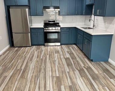 9411 1/2 Mandale Avenue - Photo Thumbnail 1