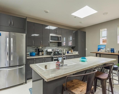 4741 Point Loma Ave - Photo Thumbnail 2